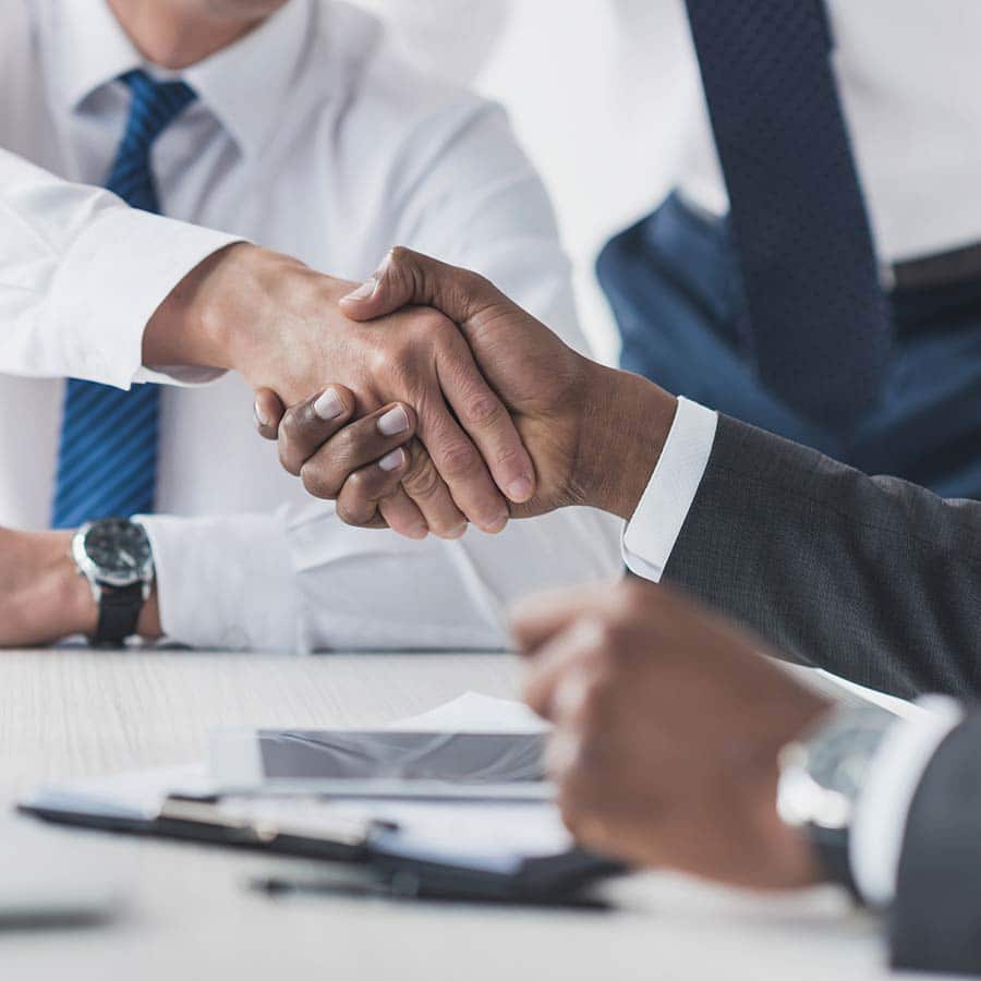 Businessmen Handshake In A Meeting