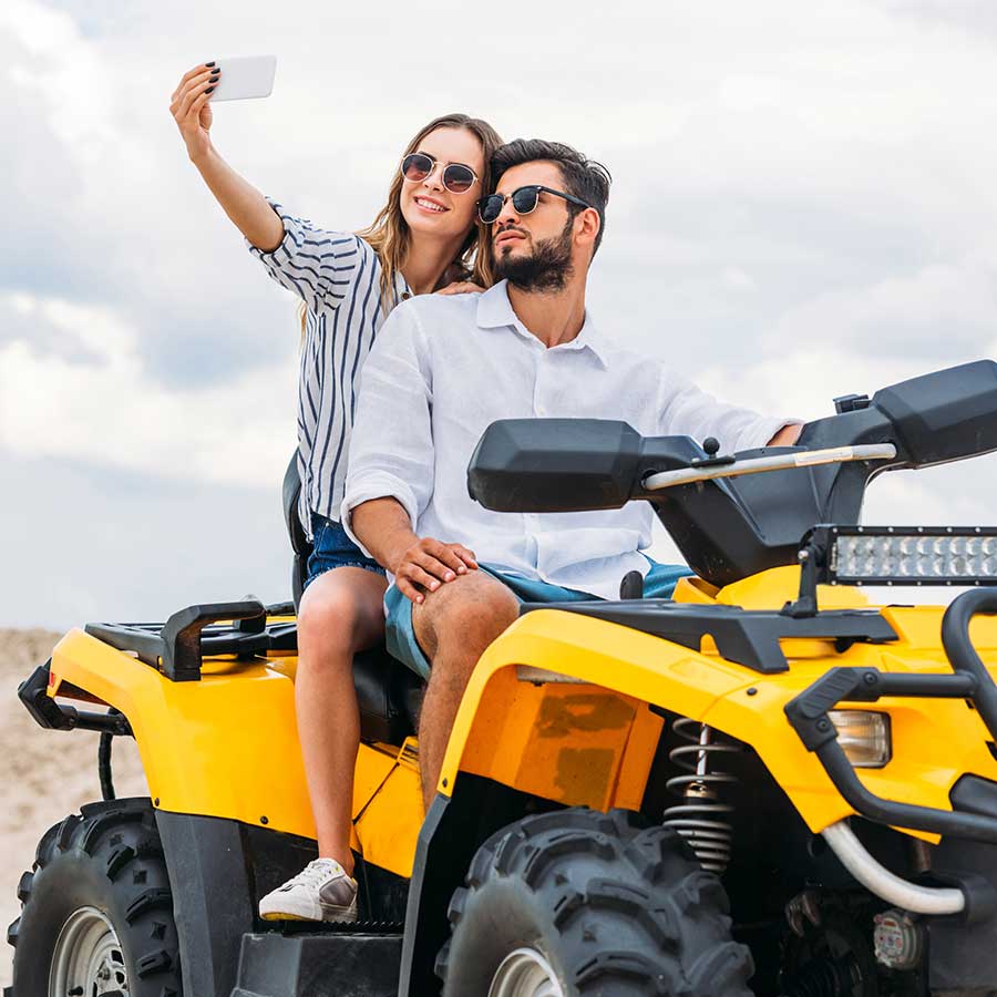 Young Couple On Atv