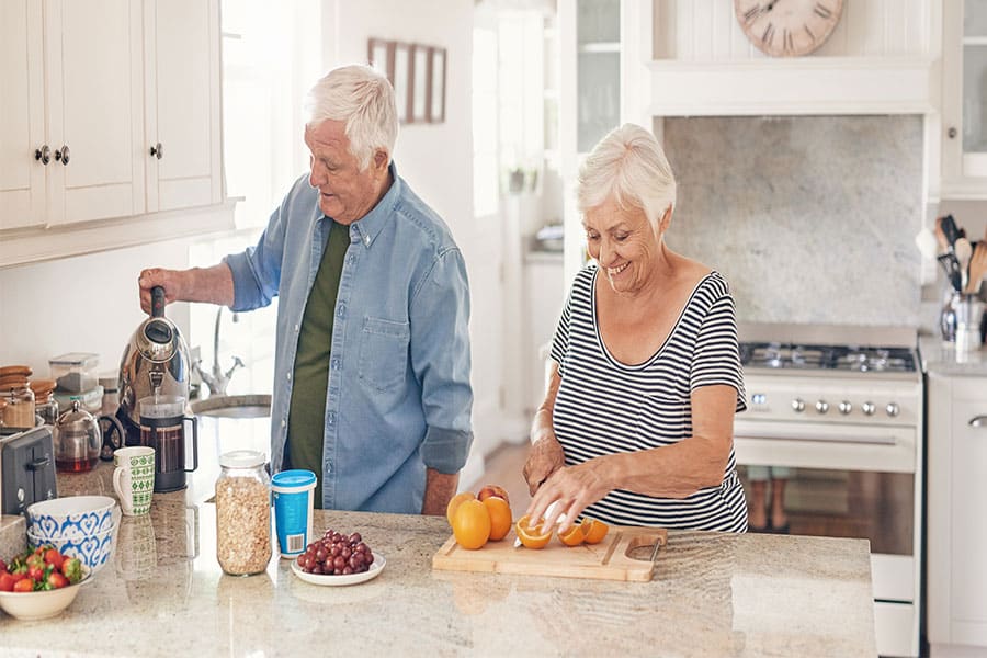 Seniors In Second Home Kitchen Home Loan Process With Lake Region Bank Hori